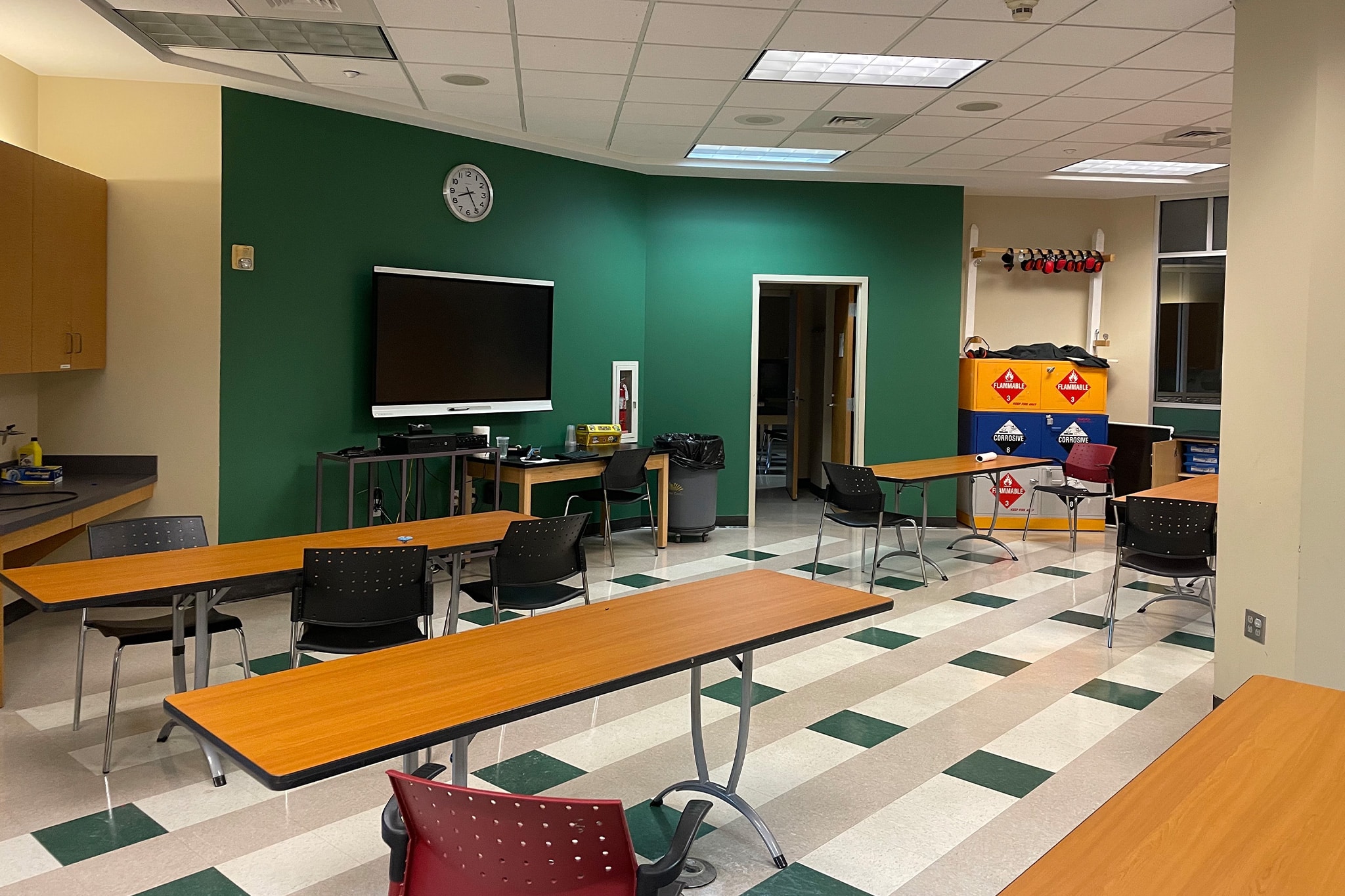 a room filled with furniture and a flat screen tv