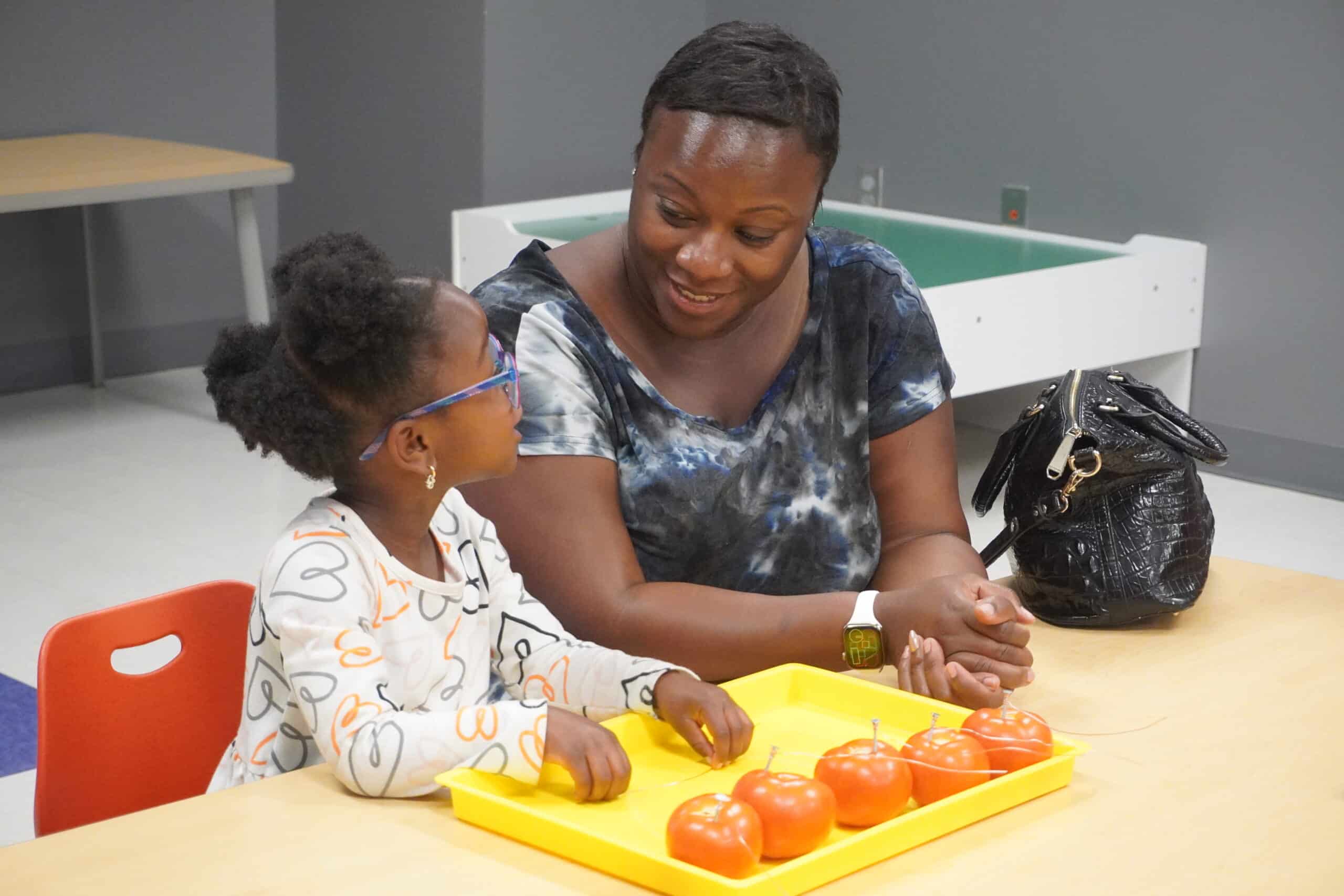 Woman at McWane Science Center with her daughter