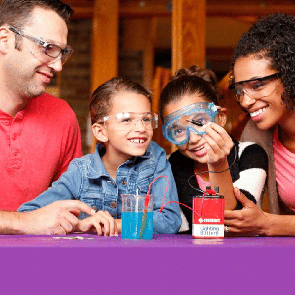a group of people sitting at a table